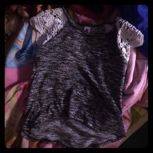 I am selling a gray  and white shirt